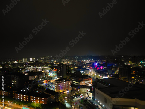 High Angle View of Illuminated Luton City and Downtown Homes During Dark Night. High Angle Footage Was Captured From Medium High Altitude with Drone's Camera on November 9th, 2024, England UK. photo