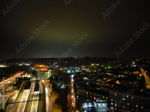 High Angle View of Illuminated Luton City and Downtown Homes During Dark Night. High Angle Footage Was Captured From Medium High Altitude with Drone's Camera on November 9th, 2024, England UK. photo