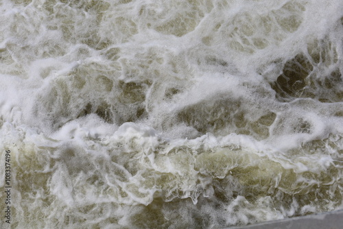 The threshold of the waterfall. The rushing water.