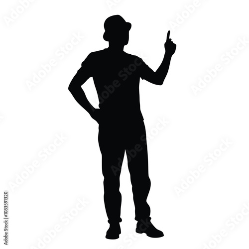 A man is standing in front of a white background. He is wearing a hat and a shirt. He is pointing to the right