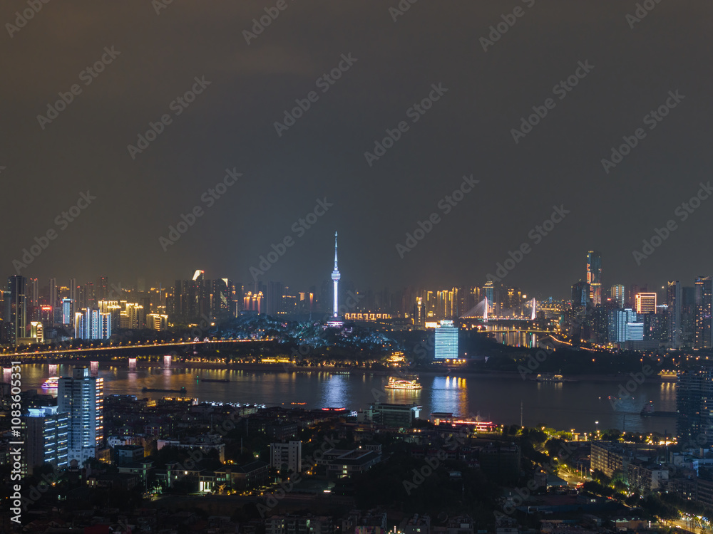 Fototapeta premium Night view of the landmark city on the two rivers and four banks of Wuhan, China