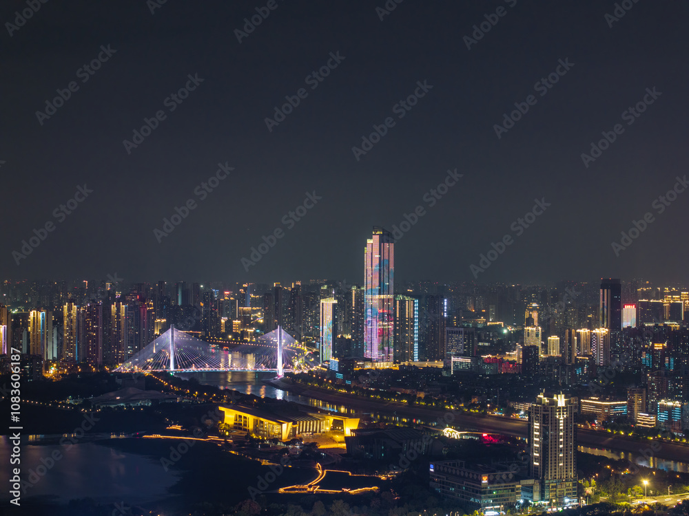 Fototapeta premium Night view of the landmark city on the two rivers and four banks of Wuhan, China