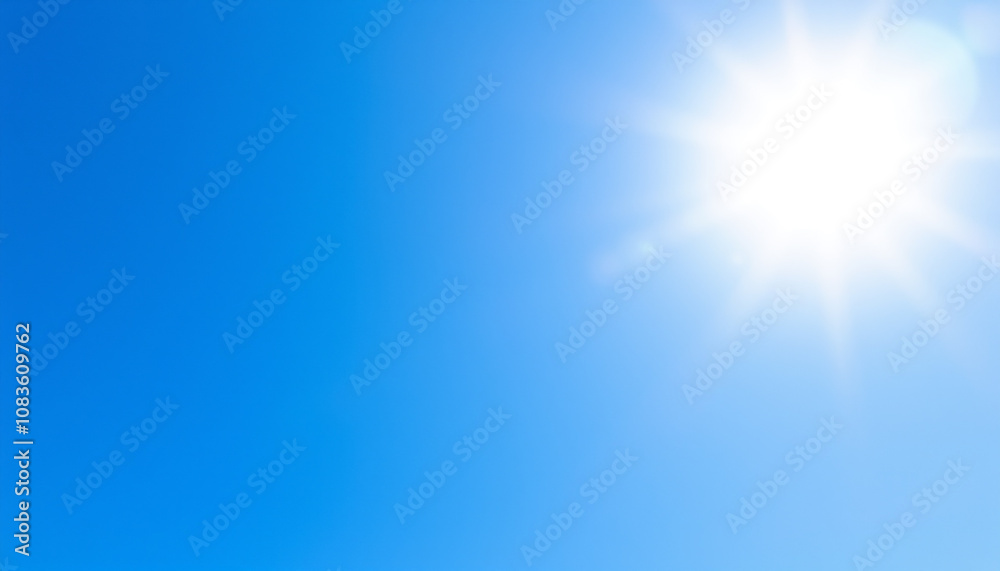 Obraz premium Beautiful blue sky with fluffy white clouds, bathed in warm sunlight