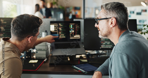Man, developer and coding support on computer screen in office for testing web application and troubleshooting. Programming, employee or mentor with advice on developing software solution at startup photo