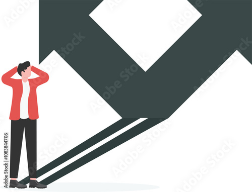 Businessman and fork, shadow of businessman standing showing left and right arrows, choice and decision of direction
