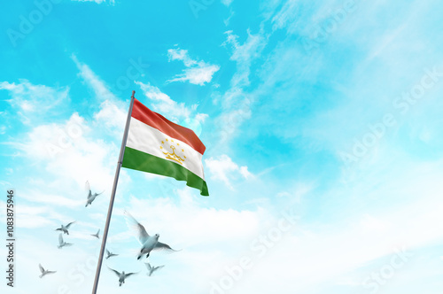 Tajikistan flag waving with flying doves in beautiful sky. Tajikistan flag for Republic Day and Independence Day. photo