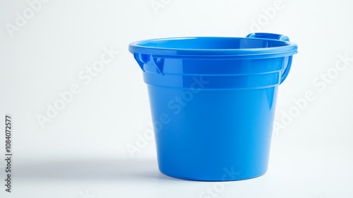 Blue Bucket with Wringer on White Background photo