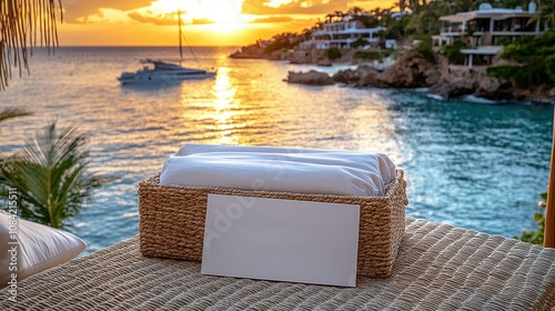 Tranquil Oceanview Sunset with Cozy Linen Basket on a Table, Capturing Serene Atmosphere of Relaxation and Beauty in a Coastal Setting photo