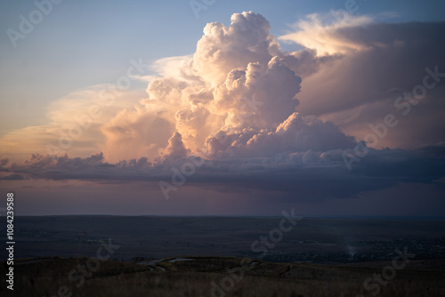 Slika na platnu Sky at dusk or dawn with fluffy purple yellow and blue cumulus clouds, colorful