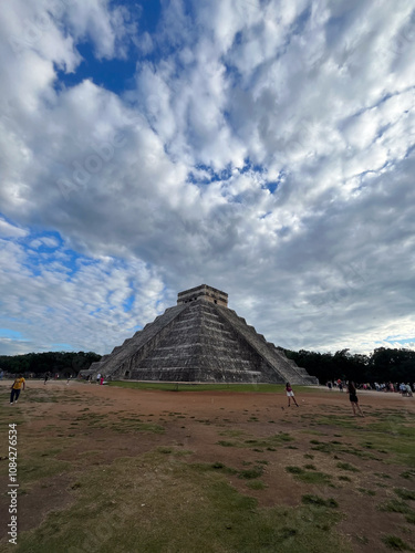 Majestic View of Chichen Itza Pyramid under Cloudy Sky