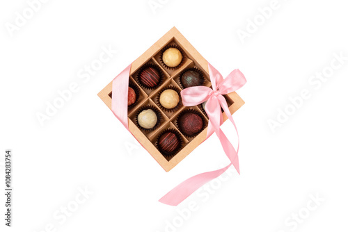 Elegant box of chocolates tied with a pink ribbon