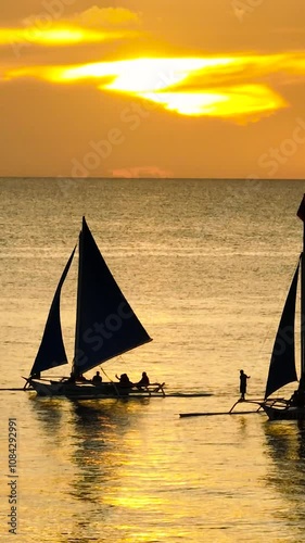 Boats over the sea with Sunset sky backgrounds. Boracay, Philippines. Vertical view. photo