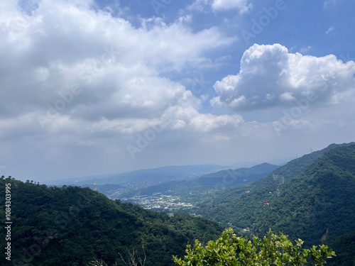Serene Mountain Landscape with Blue Sky and Clouds