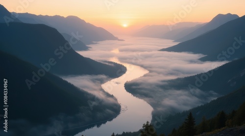 Stunning sunrise over misty mountains photo