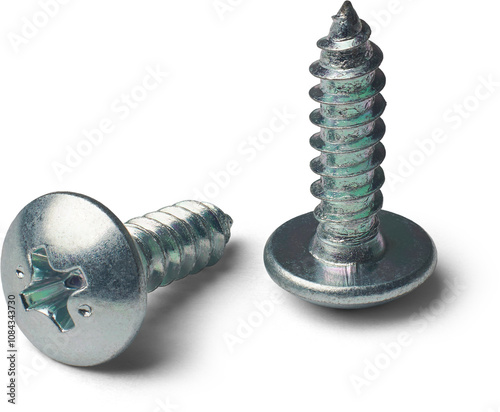 Fotografie close-up of two self tapping phillips head screws with sharp point isolated whit