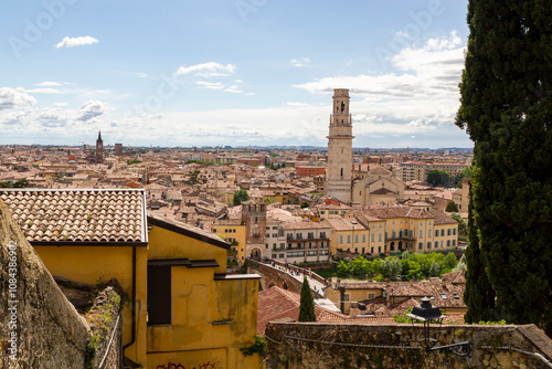 panoramic view over houses to the Santa Maria Matricolare duomo cathedral in Verona, Italy photo