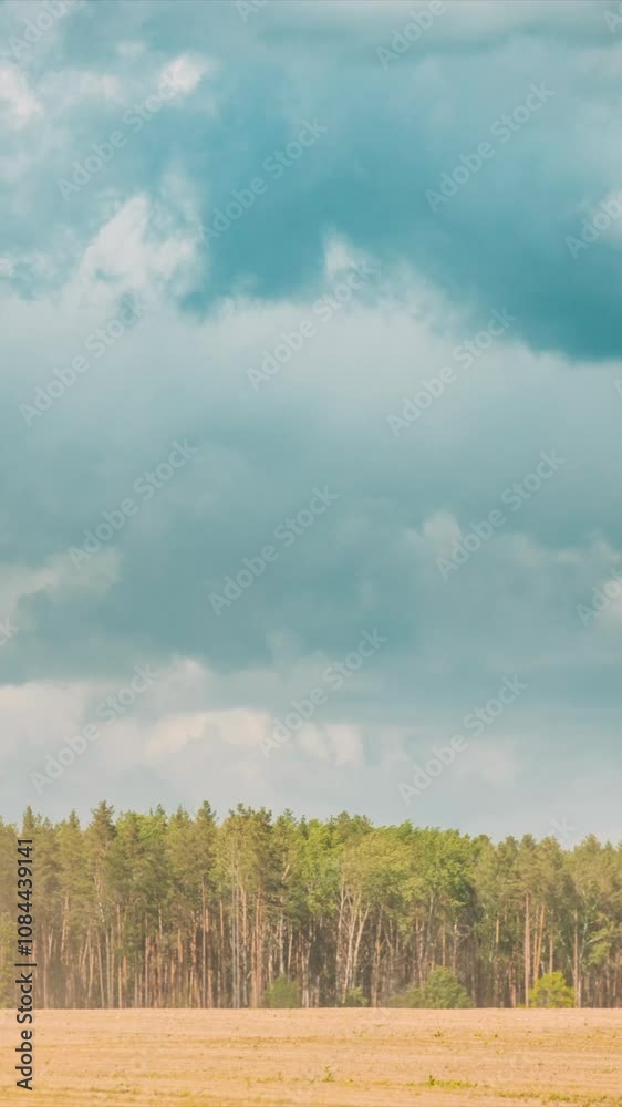 Dramatic Sky With Clouds On Horizon Above Rural Landscape Field. Abstract Light Blue Color. Background 4k Time Lapse. Cloud Shadows Float Above Field. Clouds Above Plowed Field. Colorful Cloudy Light Dramatic Sky With Clouds On Horizon Above Rural Landscape Field. Abstract Light Blue Color. Background 4k Time Lapse. Cloud Shadows Float Above Field. Clouds Above Plowed Field. Colorful Cloudy Light