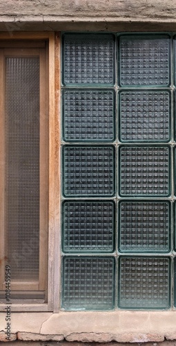 unusual design solution, glass in the wall, glass blocks in the exterior and interior in the city of Tbilisi, Georgia