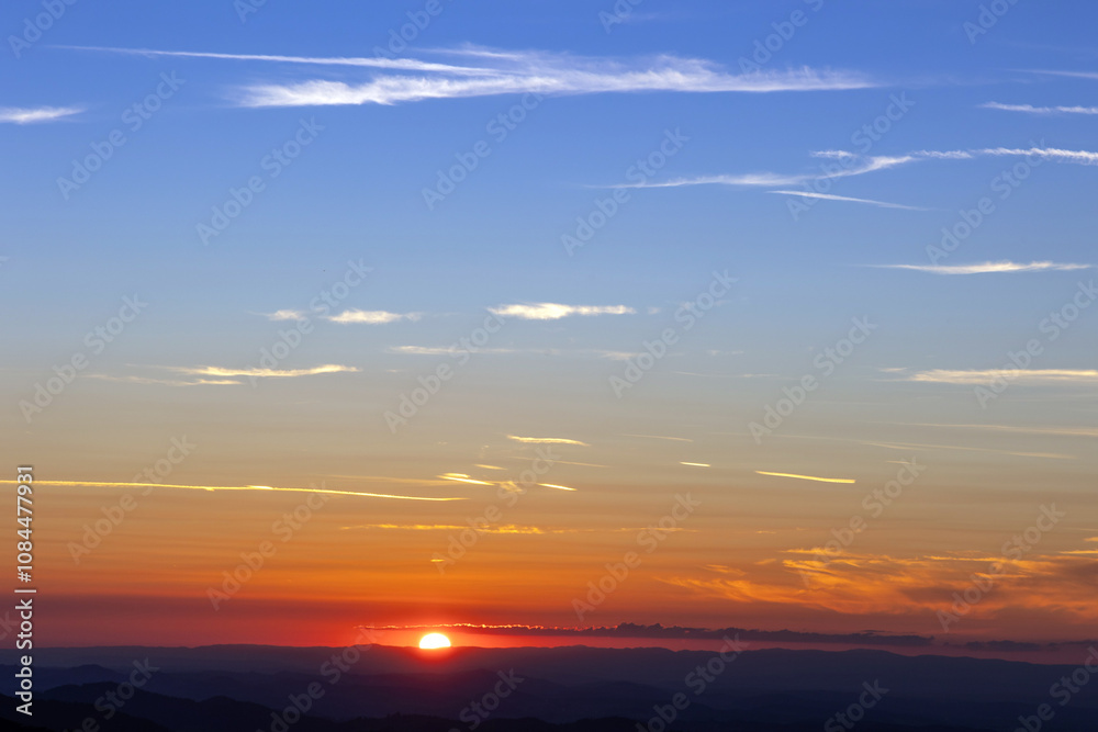 Sunset scene with blue sky - background and backdrop image Sunset scene with blue sky - background and backdrop image
