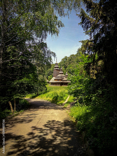 A wooden church in Transcarpathian style. It is located in Pyrogovo - the national museum of folk architecture and everyday life, under the open sky near Kyiv photo