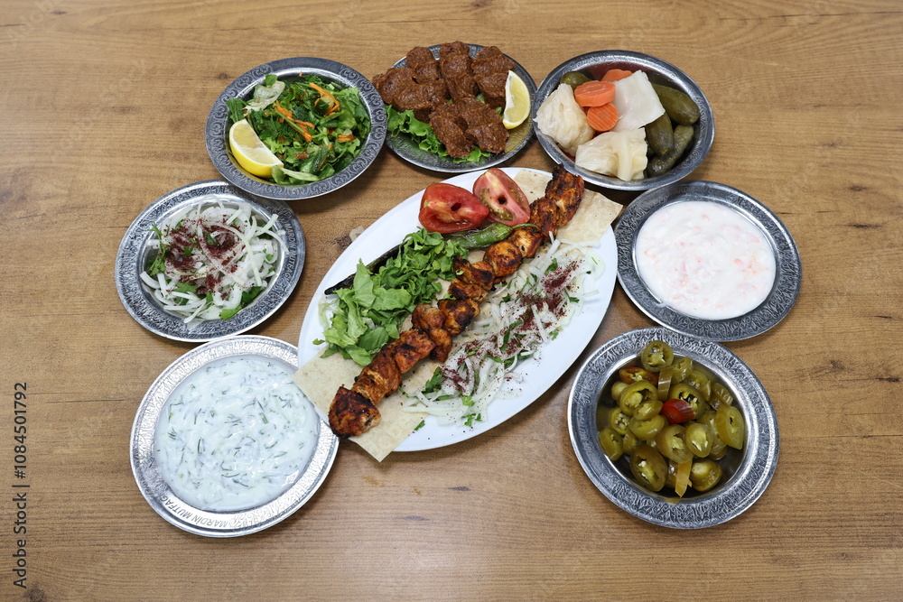 The most common variety of kebab is marinated lamb or beef cooked on a skewer. Vegetables are sometimes cooked along with them, wherein typical vegetables include eggplant, tomato, bell pepper, onions The most common variety of kebab is marinated lamb or beef cooked on a skewer. Vegetables are sometimes cooked along with them, wherein typical vegetables include eggplant, tomato, bell pepper, onions
