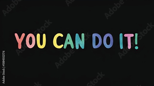 Motivational phrase “You can do it!” on a black background written in cheerful colorful letters