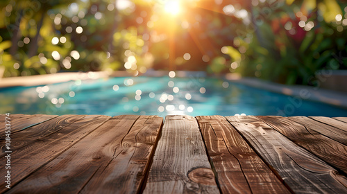 Wooden table surface against a serene pool background, ideal for showcasing beauty products, tropical designs, or relaxation concepts.