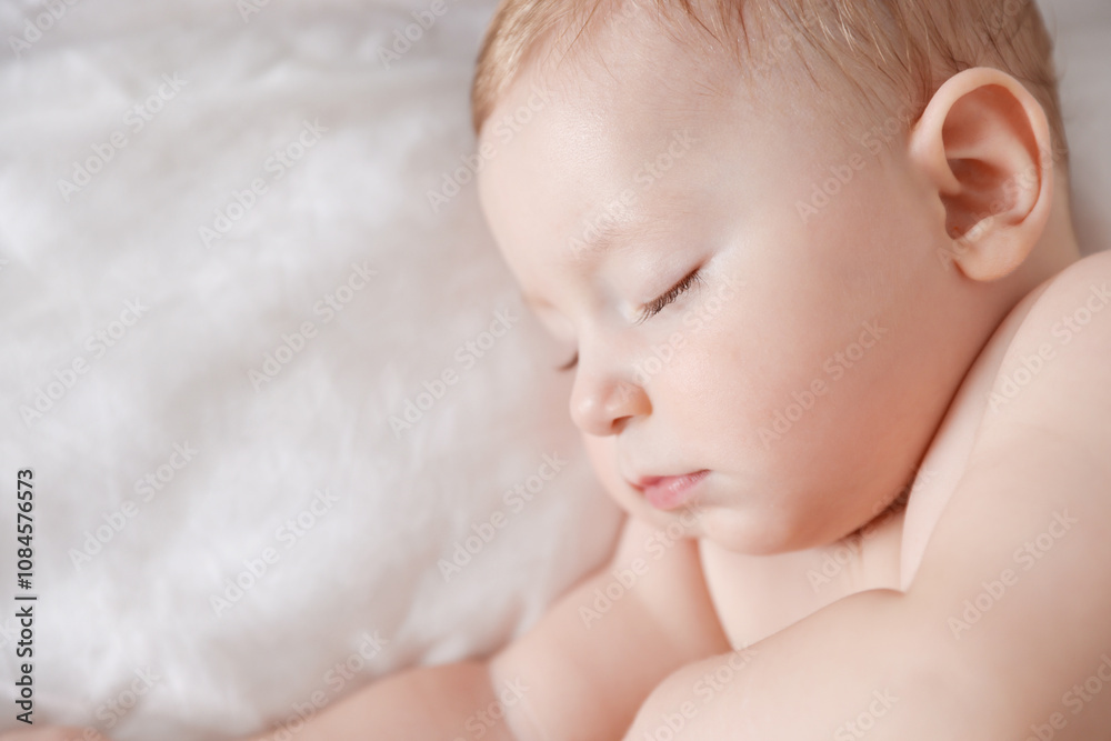 Cute little baby sleeping on bed, top view Cute little baby sleeping on bed, top view