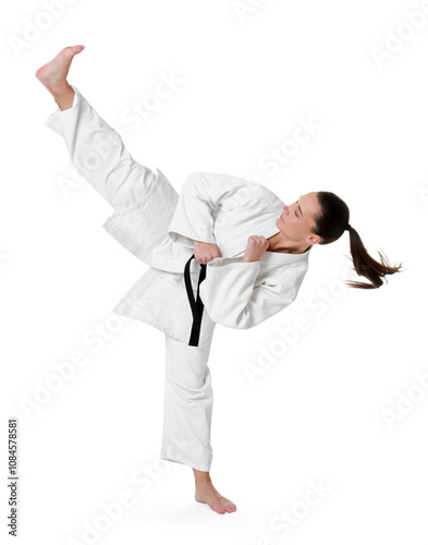 Young woman in kimono practicing karate on white background photo