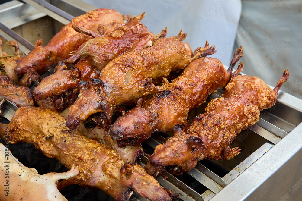 A true taste of tradition in Cusco.Roasted guinea pig, or 'cuy,' is more than just a dish—it's a culinary experience steeped in history. Savored for generations. A true taste of tradition in Cusco.Roasted guinea pig, or 'cuy,' is more than just a dish—it's a culinary experience steeped in history. Savored for generations.