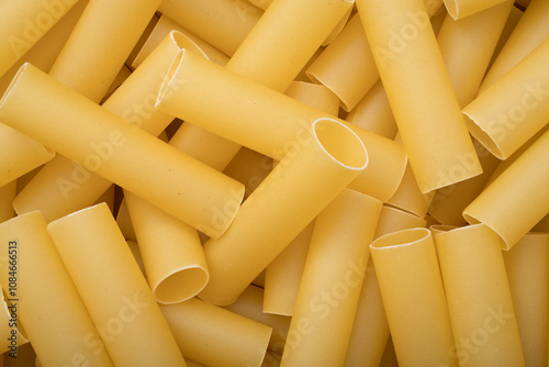 Close-Up of Uncooked Manicotti Pasta Tubes - Italian Culinary Ingredients photo