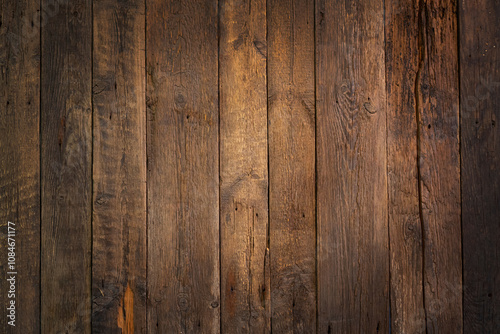 Rustic weathered wooden background. Center light area. Textured backdrop. photo