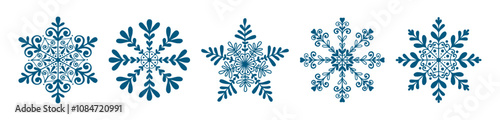 Hand drawn set of Christmas design doodle elements. Snowflakes in sketch style. Outline vector illustration