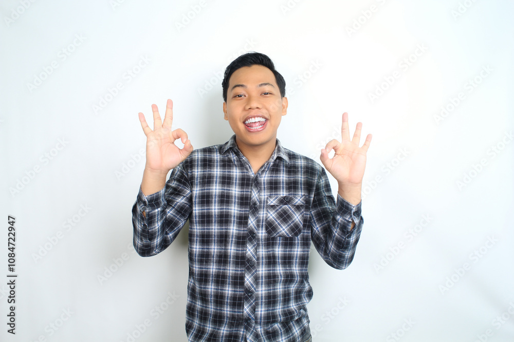 happy asian man showing okay sign with smiling face isolated on white background wearing plaid shirt happy asian man showing okay sign with smiling face isolated on white background wearing plaid shirt