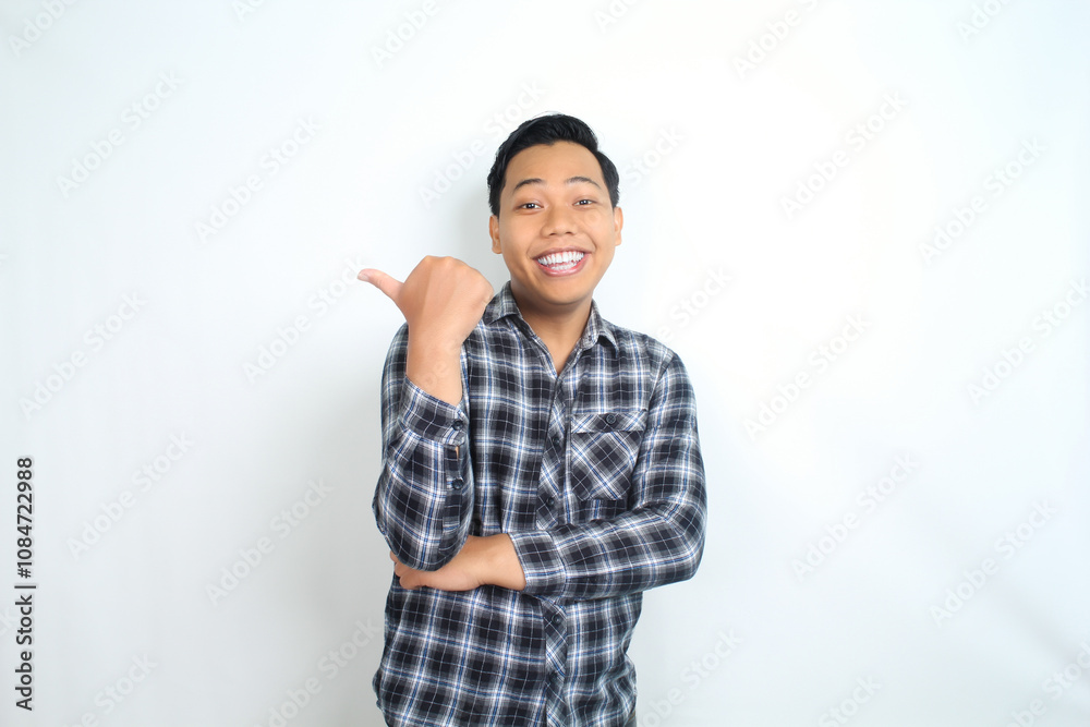 happy asian man pointing hand with smiling face and confident gesture isolated on white backgroun wearing plaid shirt happy asian man pointing hand with smiling face and confident gesture isolated on white backgroun wearing plaid shirt