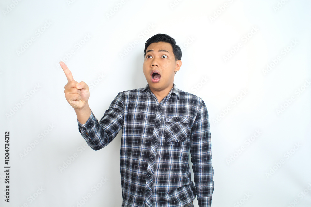 shocked asian man pointing finger with scared face isolated on white wearing casual shirt shocked asian man pointing finger with scared face isolated on white wearing casual shirt
