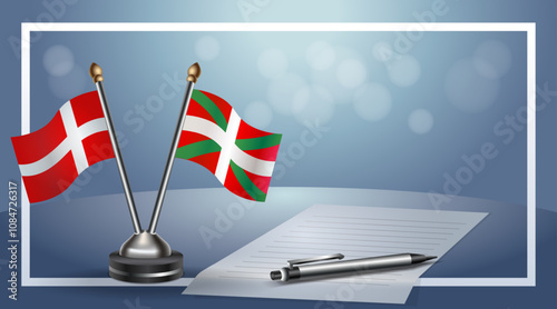 Denmark and Basque lands National flags on small table with bokeh background, cooperative relationship