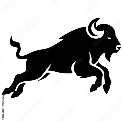 Silhouette of a bull jumping