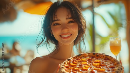 Cheerful young brunette holding a pizza on a terrace with a refreshing vibe