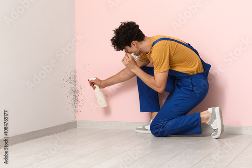 Male worker of cleaning ser...
