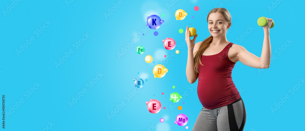 Fototapeta premium Sporty pregnant woman with apple and dumbbell on blue background