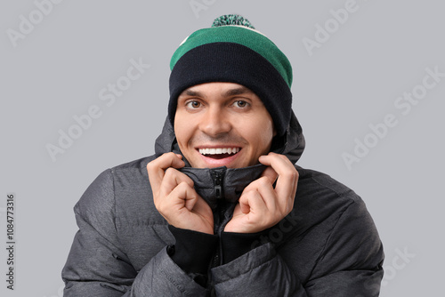 Young man in stylish puffer...