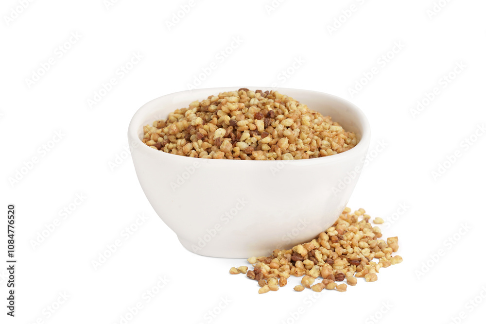 Bowl with raw buckwheat grains on white background Bowl with raw buckwheat grains on white background