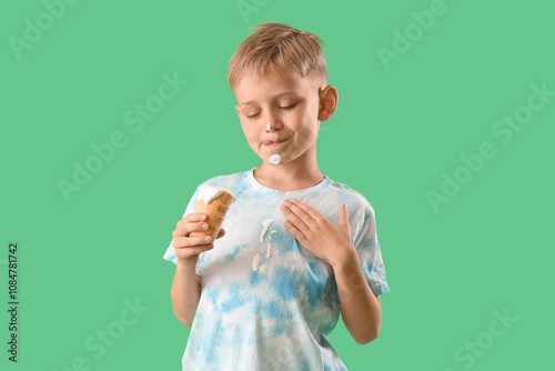 Little boy with ice-cream a...