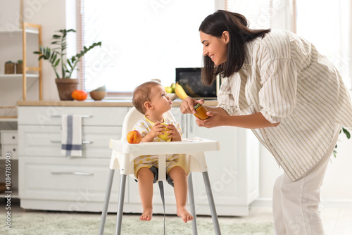 Mother with jar of tasty fo...