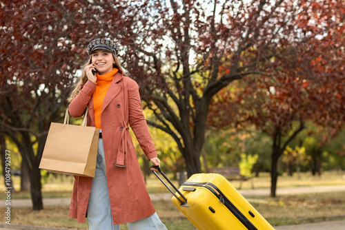 Female tourist with bags ta...