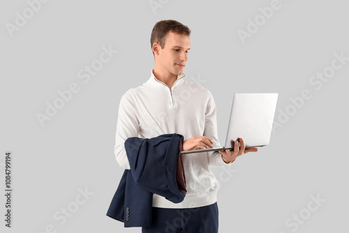 Young businessman holding l...