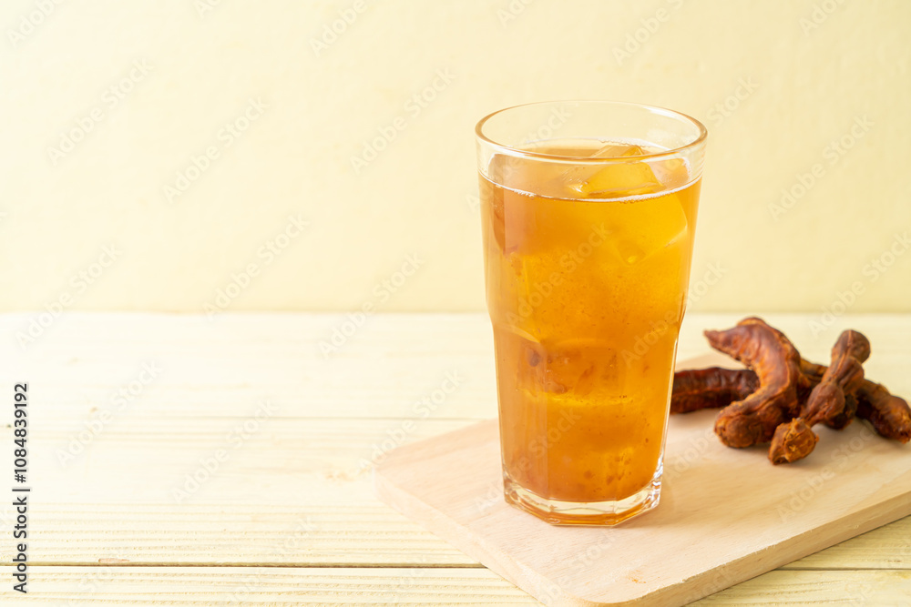 Delicious sweet drink tamarind juice and ice cube Delicious sweet drink tamarind juice and ice cube