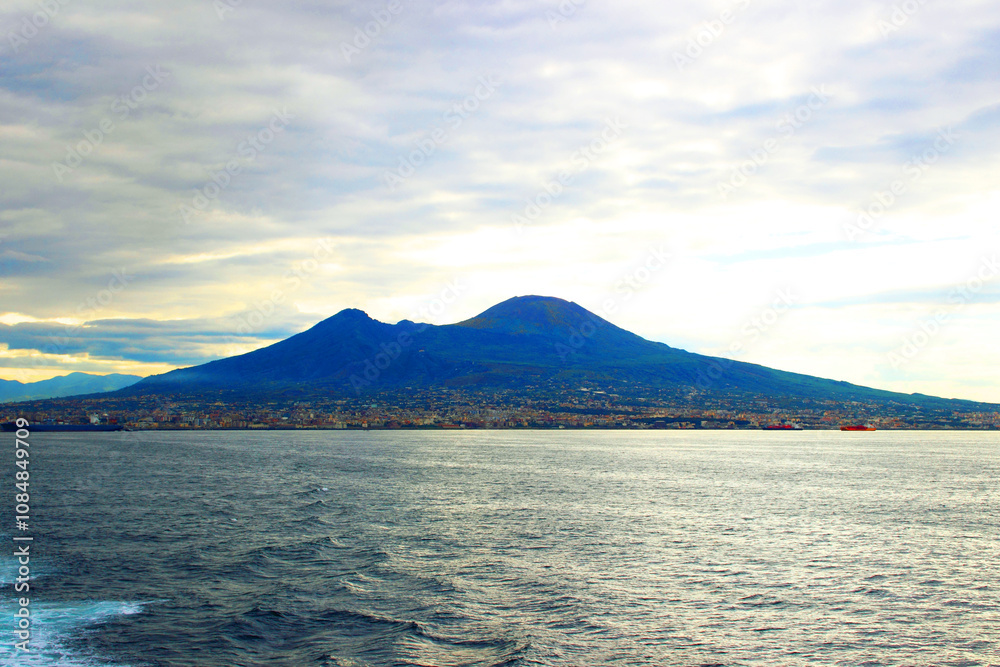 Fotografie Crisp view from Naples at the staggering Mount Vesuvius soaring in the dramatic-