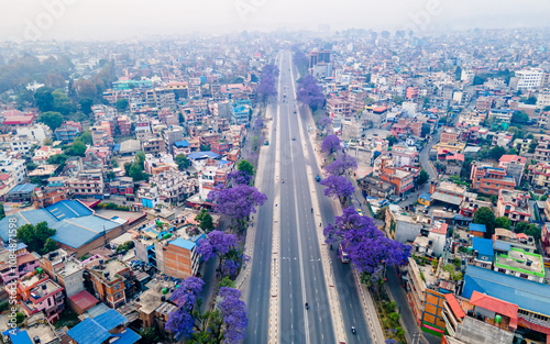 aerial view of the blossom Jacaranda tree in highway Lalitpur, Nepal. 